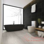 3d rendering luxury bathroom near window with bathtub